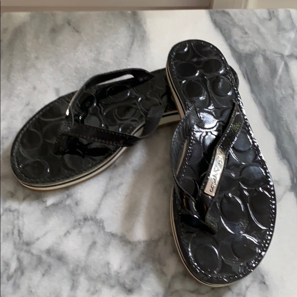 Coach women’s black flip flops, great condition